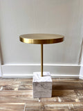 Contemporary white marble and brass top side table.