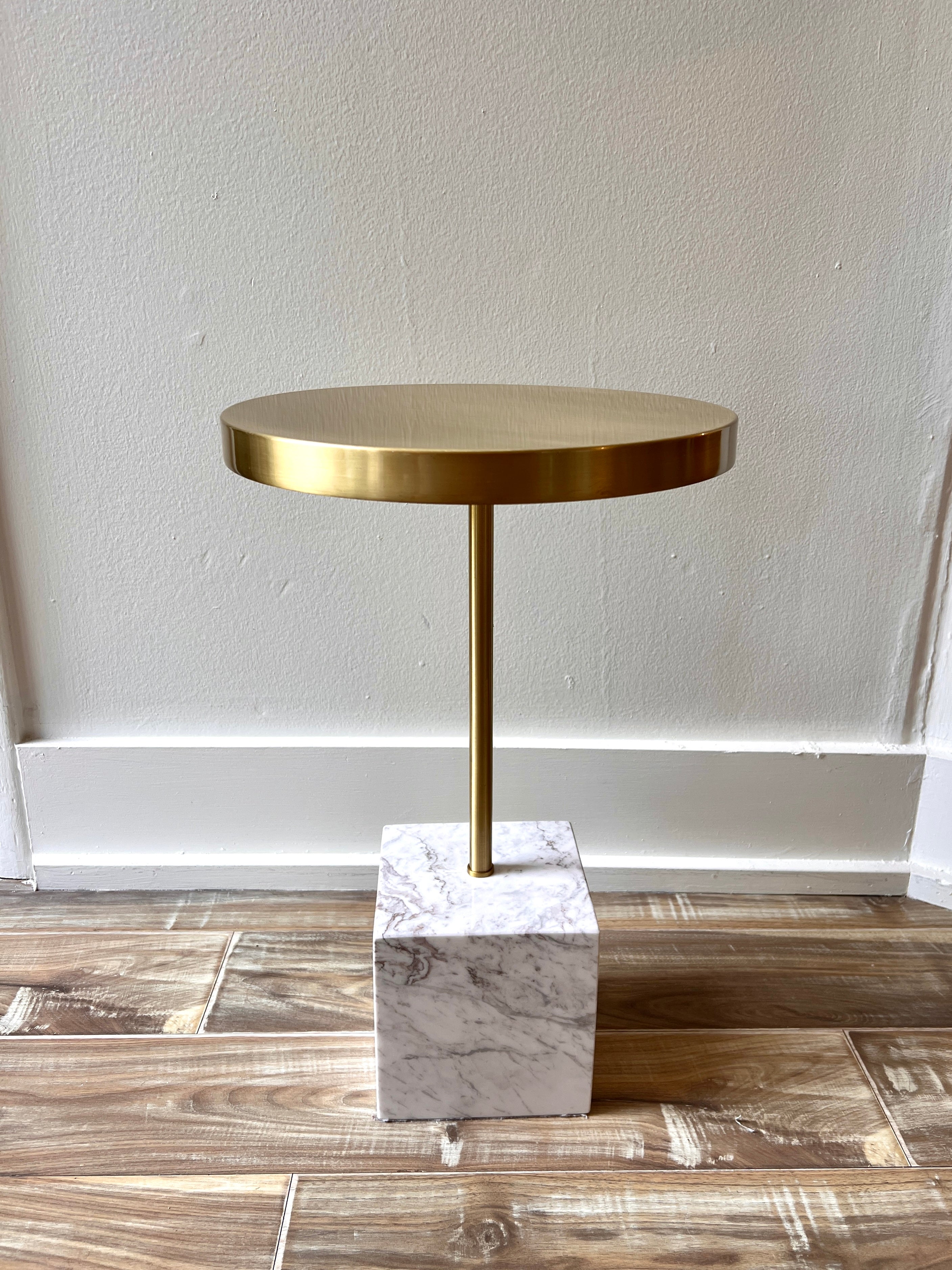 Contemporary white marble and brass top side table.