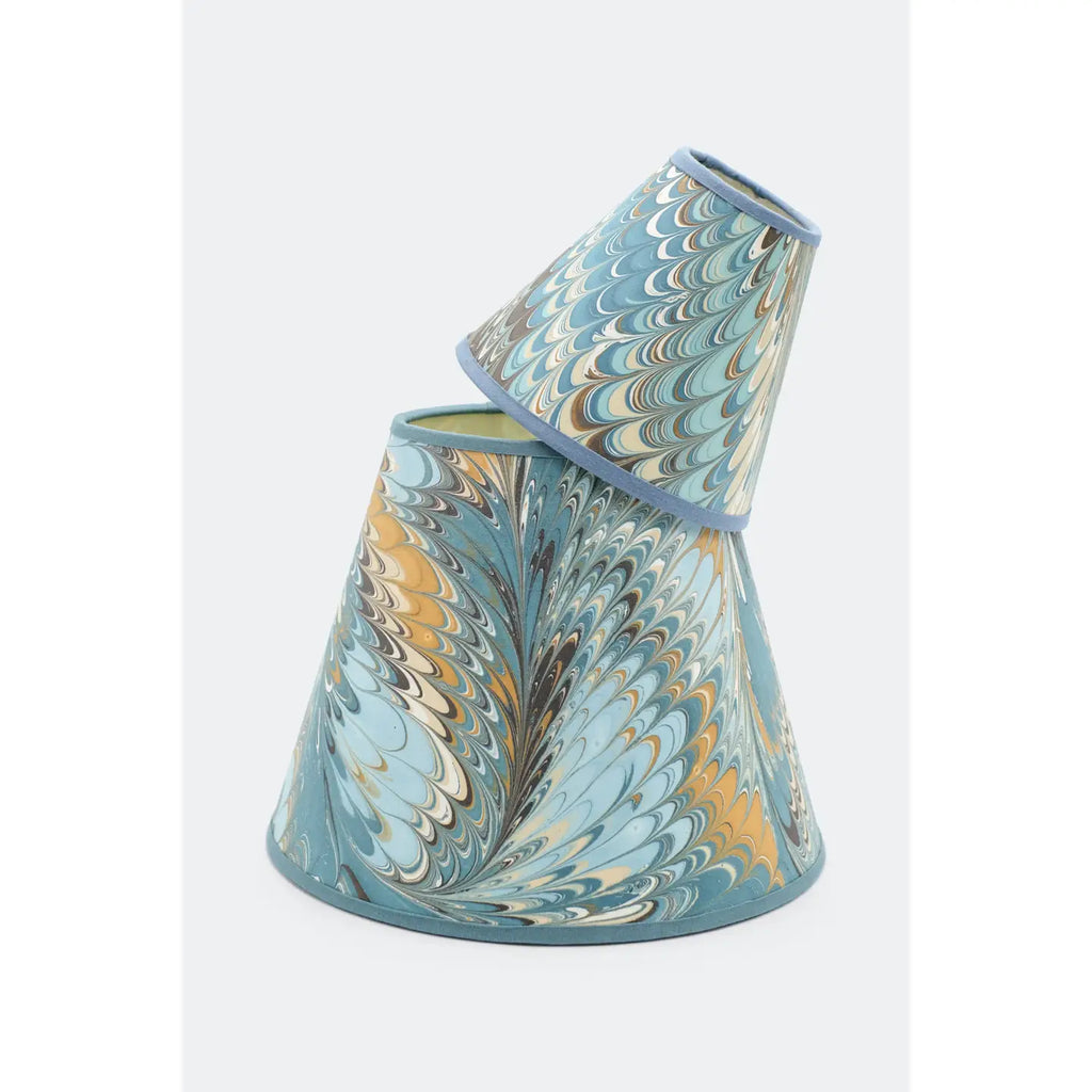 Hand marbled paper lampshades in shades of aqua, brown, caramel, and cream with blue trim