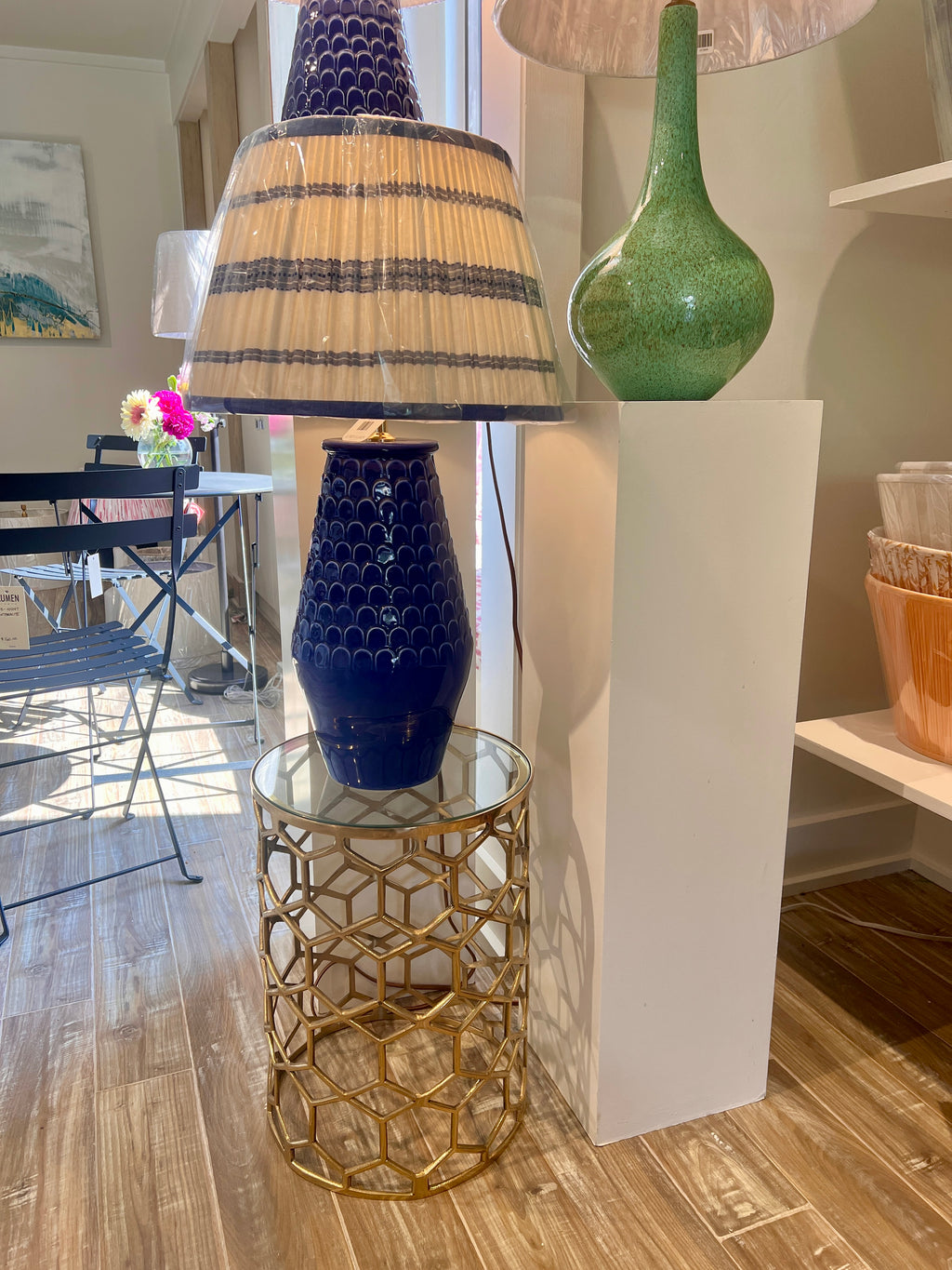 Contemporary brass and glass accent table with geometric honeycomb pattern, styled in Nashville, Tennessee