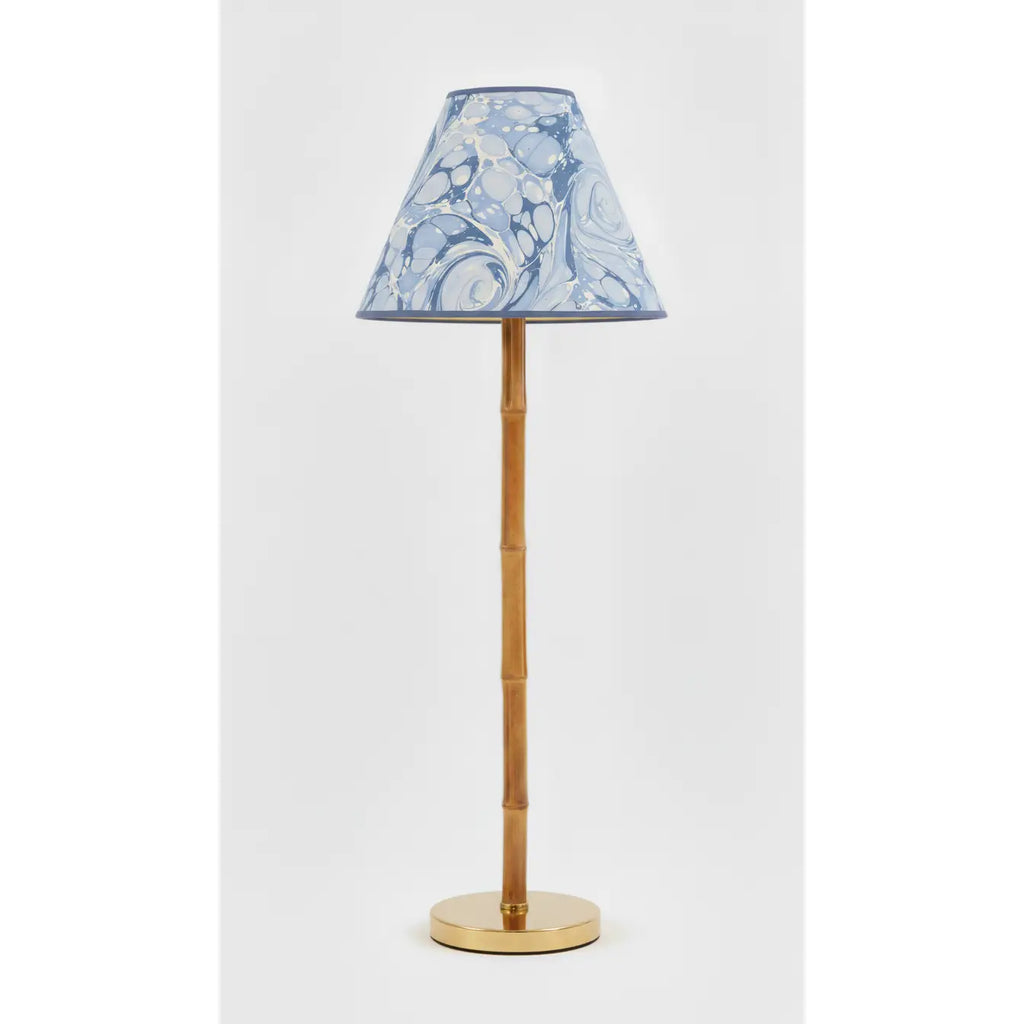 Ocean Marbled Empire Lampshade in blue tones styled on a wood table lamp in Nashville, Tennessee