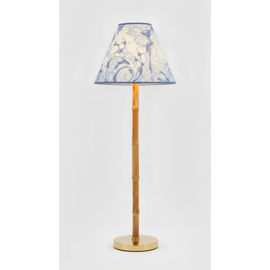 Ocean Marbled Empire Lampshade in blue tones styled on a wood table lamp in Nashville, Tennessee