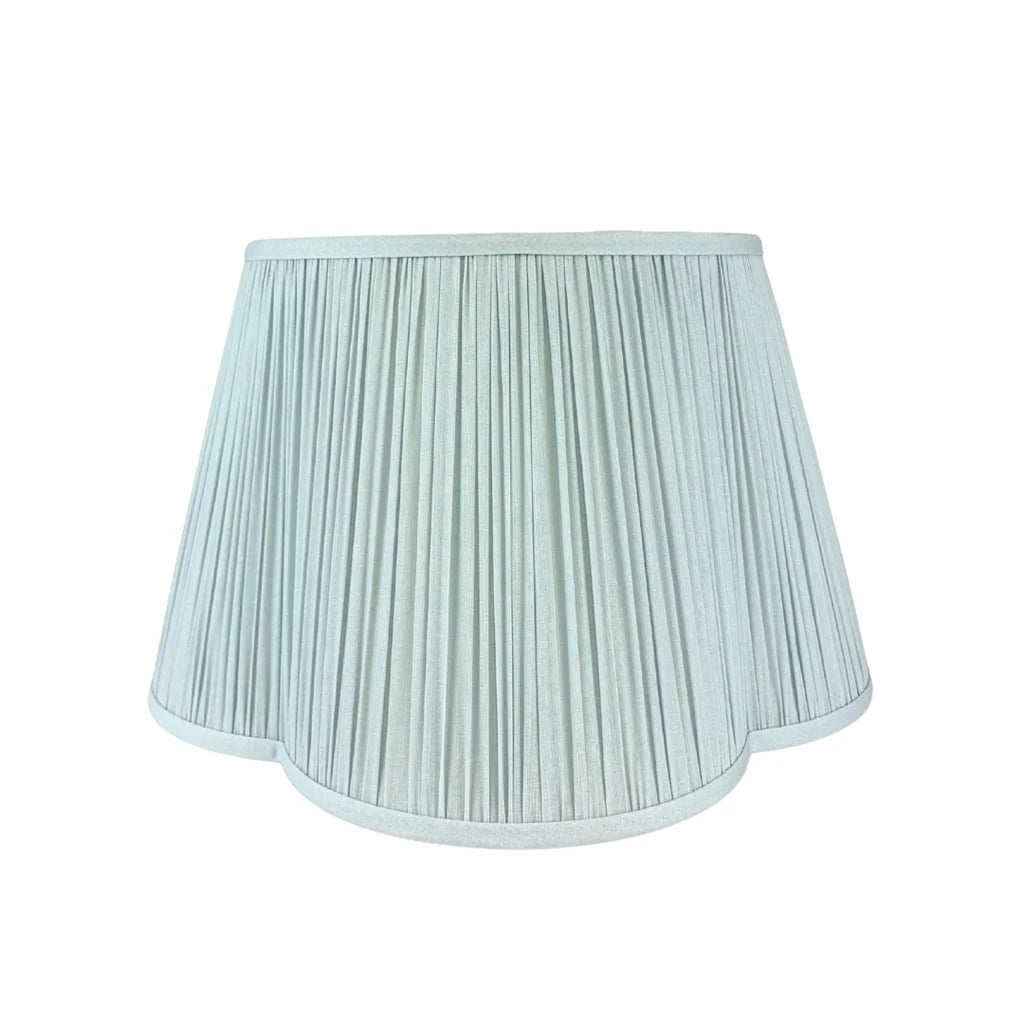 International Blue Quatrafoil Lampshade featuring finely pleated light blue fabric, a scalloped quatrefoil bottom edge, and matching tonal trim.