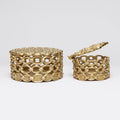 Set of decorative lidded brass boxes with a chain motif