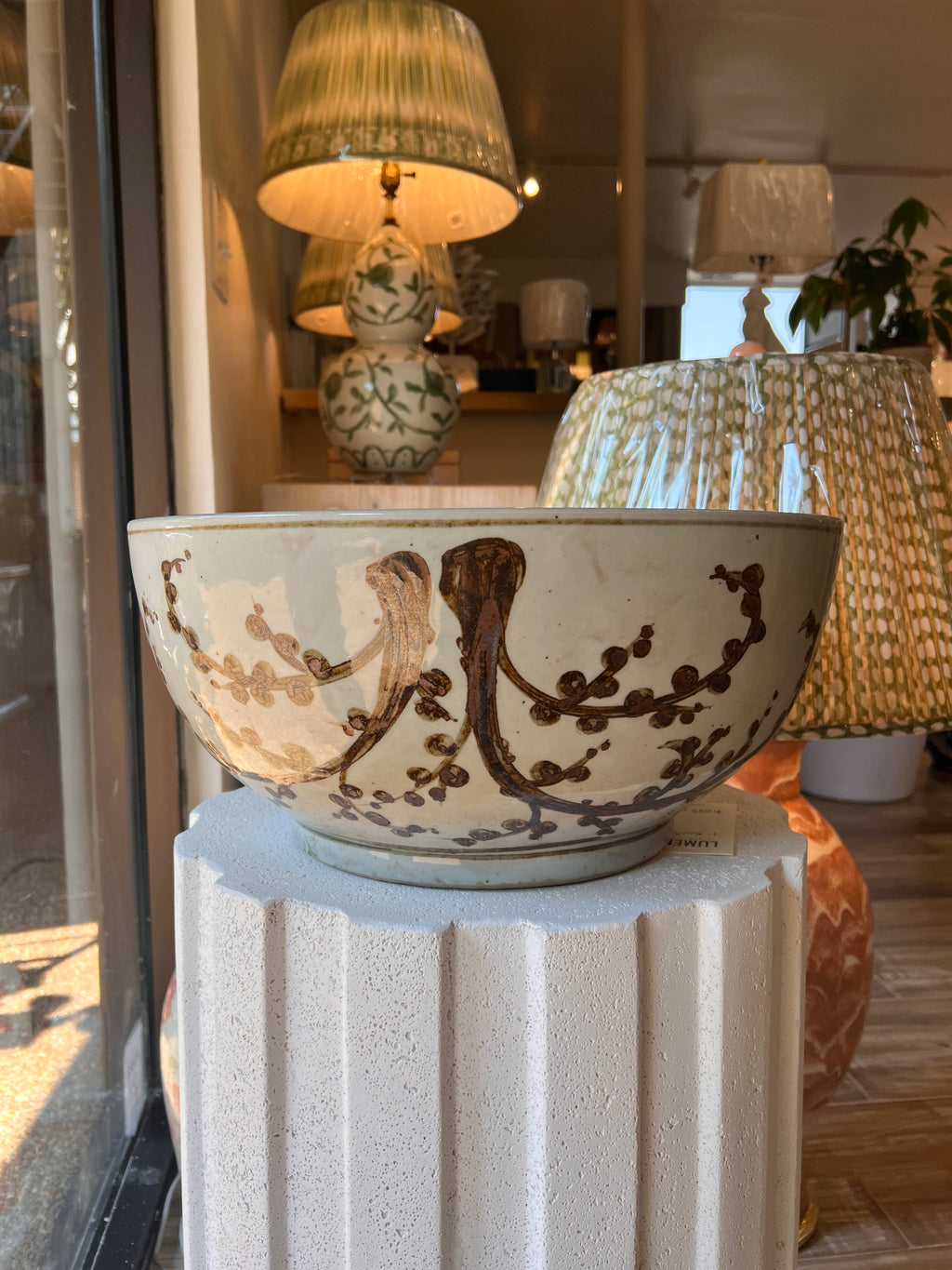 Cream and brown ceramic decorative bowl with Asian inspired branch and blossom motif 