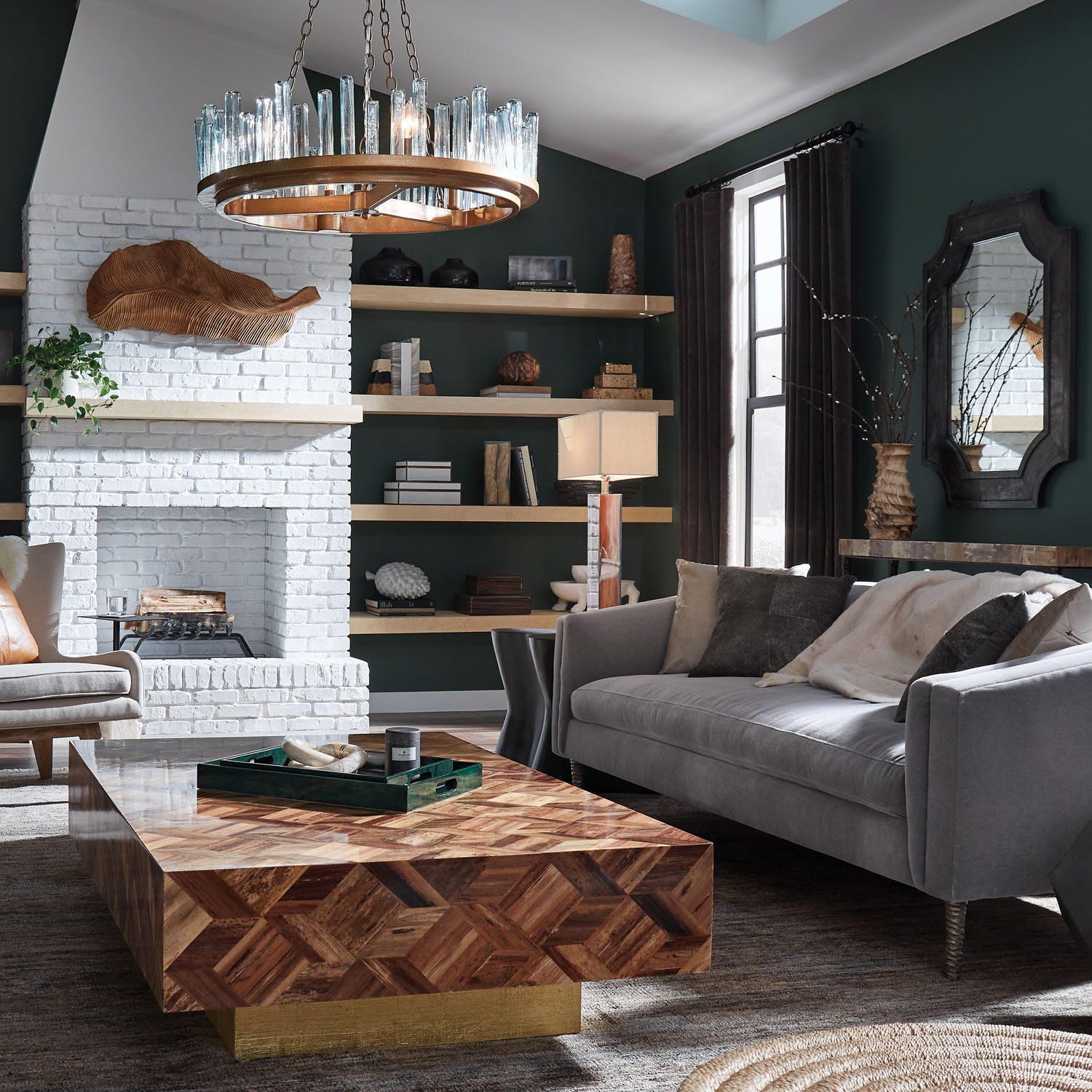 Decorative pinecone objects made from reconstituted stone in a light gray finish, styled in a luxury mountain home living room in Nashville, Tennessee