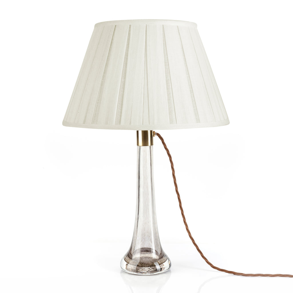 Fermoie Ivory Box Pleat Lampshade styled on a glass table lamp in Nashville, Tennessee