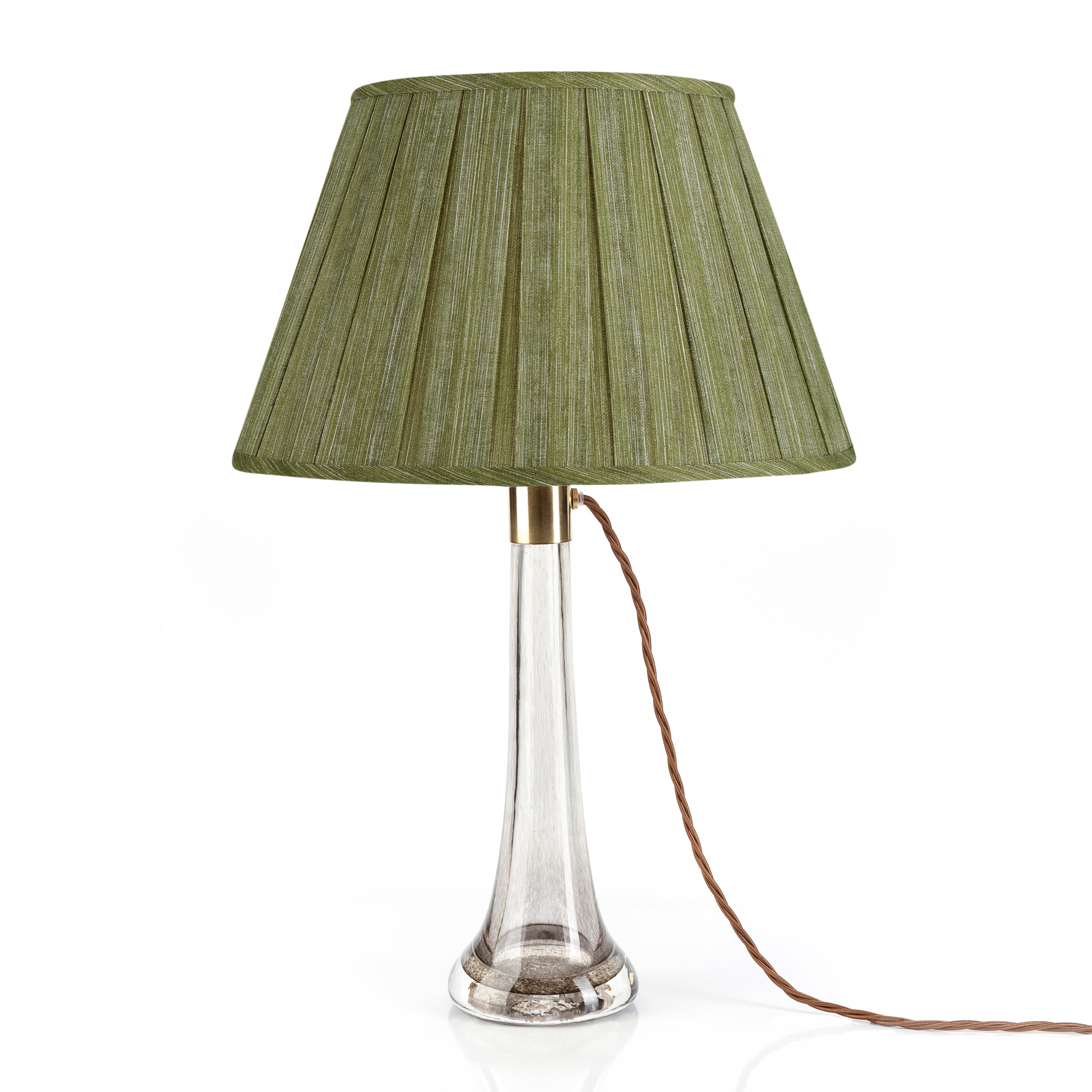 Fermoie Kintyre Green Box Pleat Lampshade styled on a glass table lamp in Nashville, Tennessee