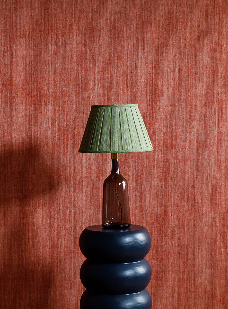 Fermoie Kintyre Green Box Pleat Lampshade styled on a glass table lamp in Nashville, Tennessee