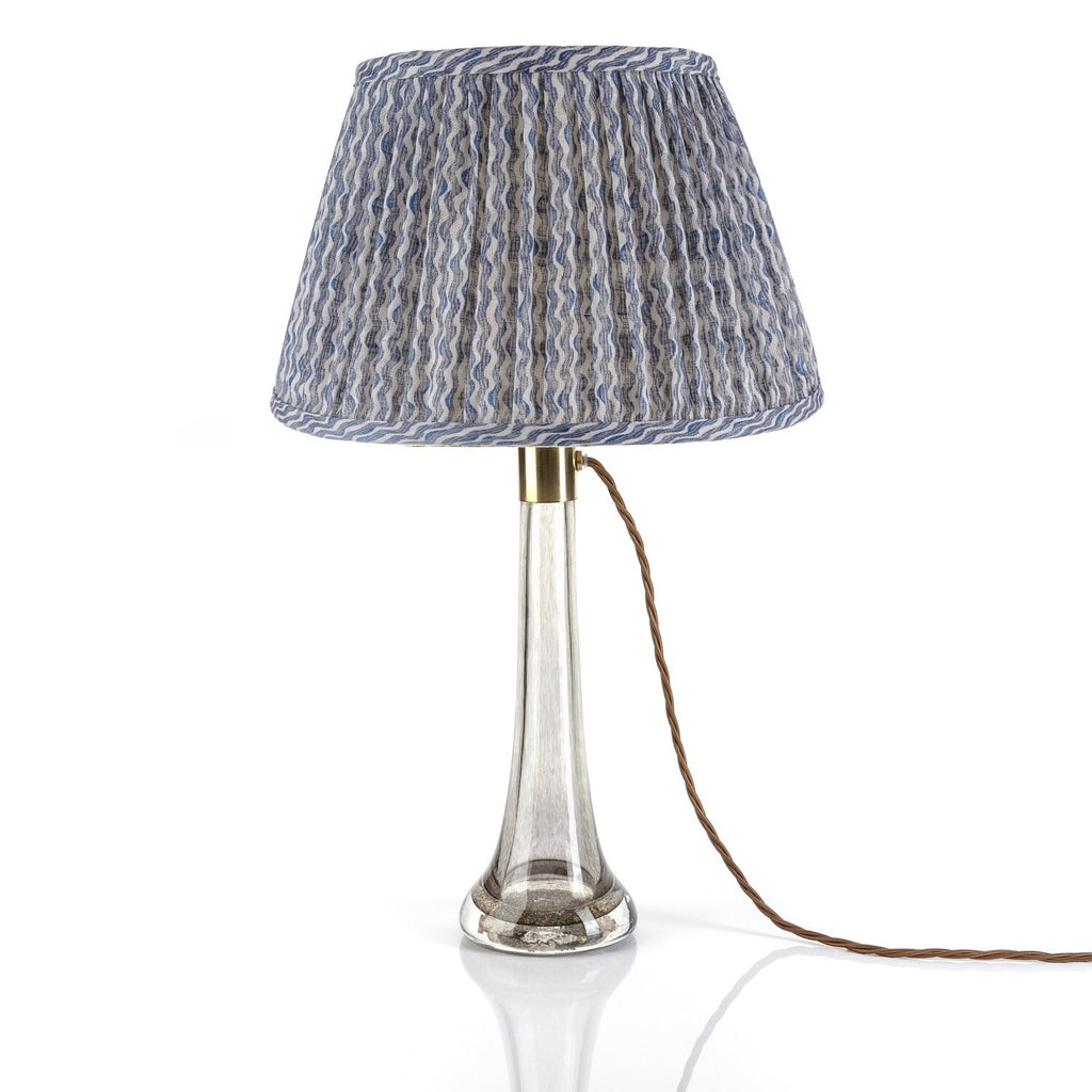 Fermoie Blue Popple Empire lampshade styled on a glass table lamp in Nashville, Tennessee