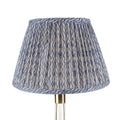 Fermoie Blue Popple empire lampshade styled on a glass table lamp in Nashville, Tennessee