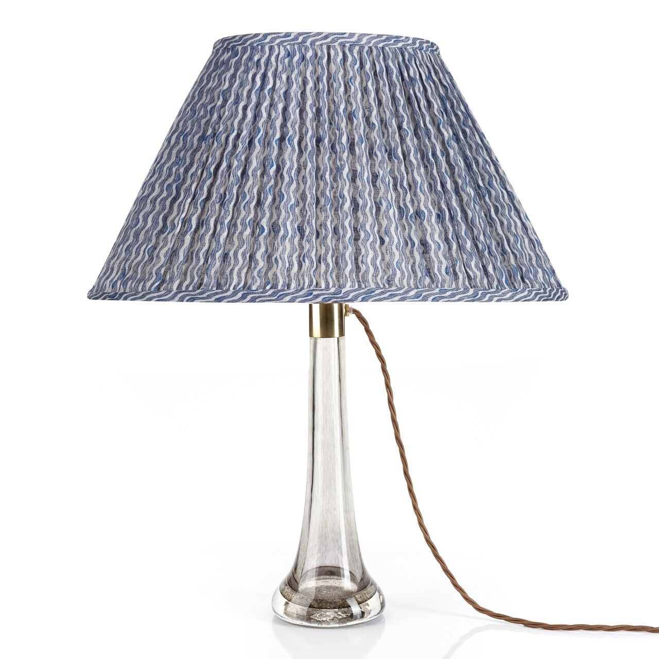 Fermoie Blue Popple oval lampshade styled on a glass table lamp in Nashville, Tennessee
