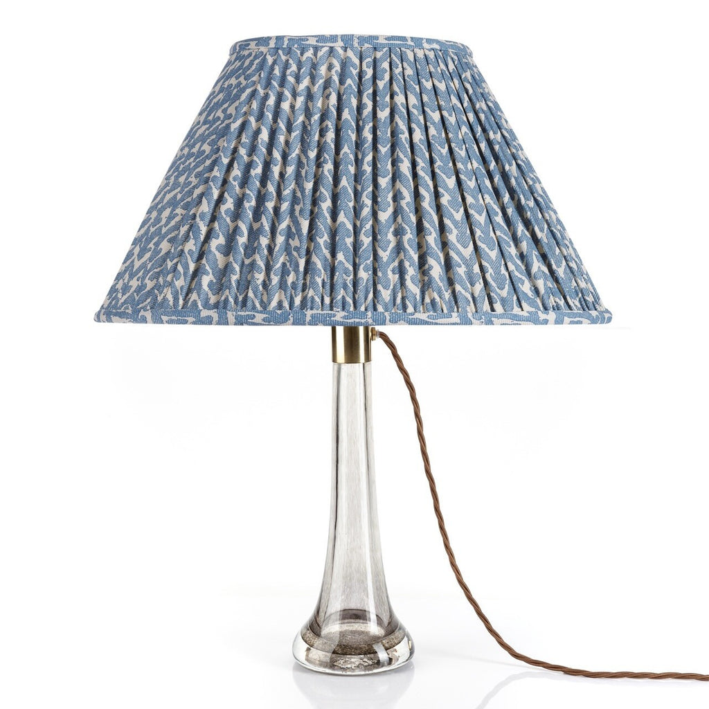 Fermoie Blue Rabanna Oval Lampshade styled on a glass table lamp in Nashville, Tennessee