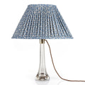 Fermoie Blue Rabanna Oval Lampshade styled on a glass table lamp in Nashville, Tennessee