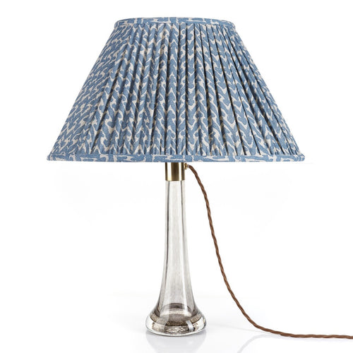 Fermoie Blue Rabanna Oval Lampshade styled on a glass table lamp in Nashville, Tennessee