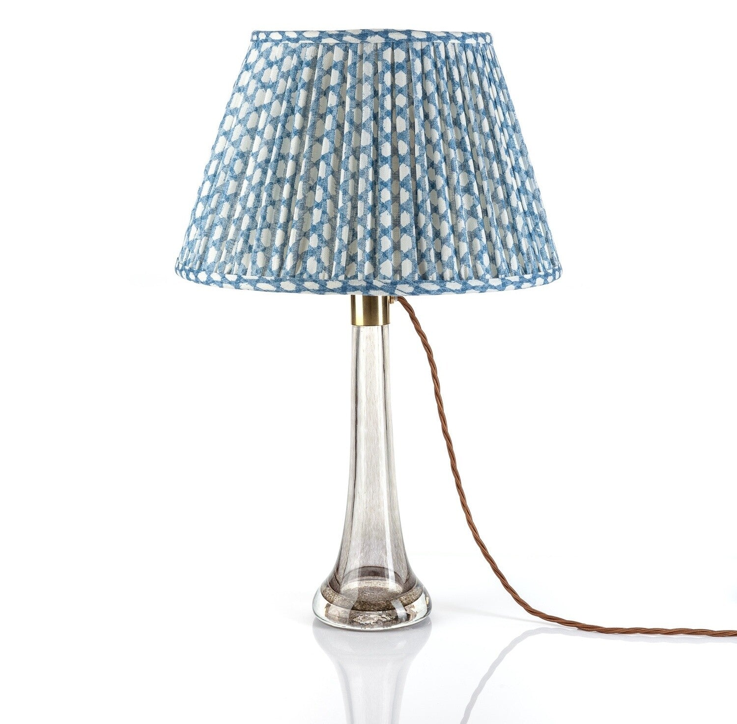 Fermoie Blue Wicker empire lampshade styled on a glass table lamp in Nashville, Tennessee