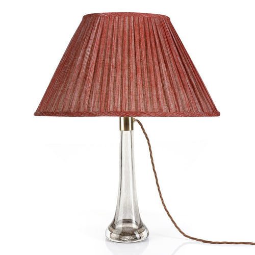 Fermoie Carpet Slipper oval lampshade styled on a glass table lamp in Nashville, Tennessee