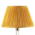 Fermoie Club Yellow empire lampshade styled on a glass table lamp in Nashville, Tennessee