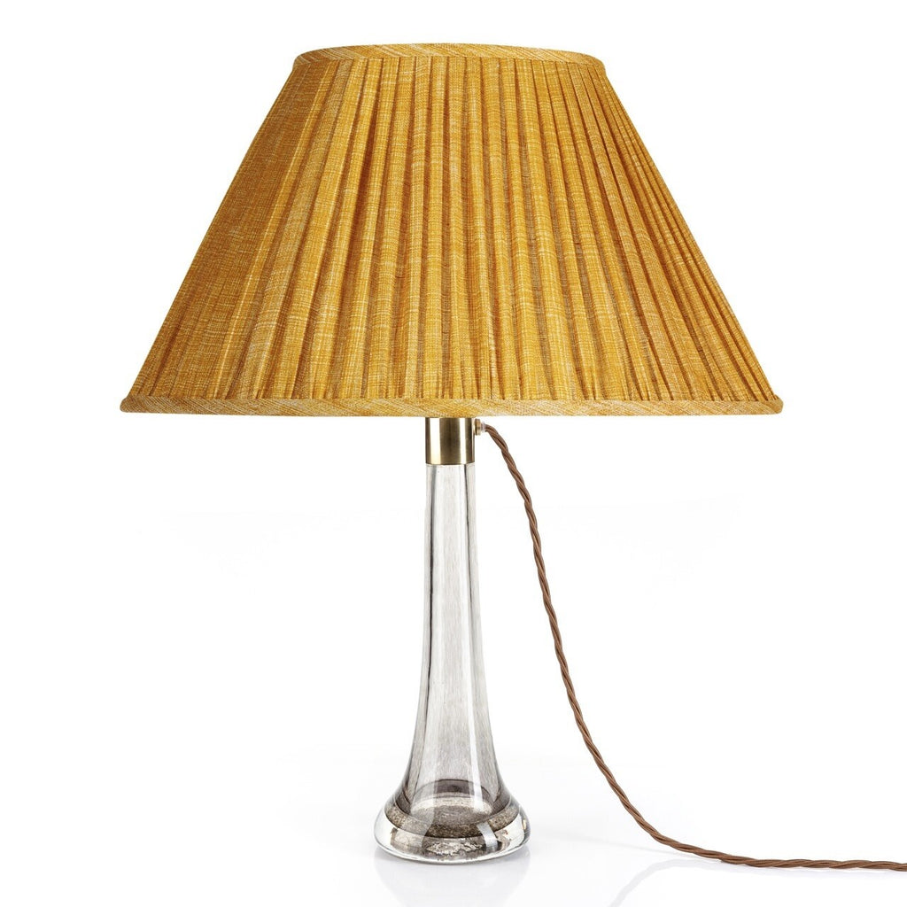 Fermoie Club Yellow oval lampshade styled on a glass table lamp in Nashville, Tennessee