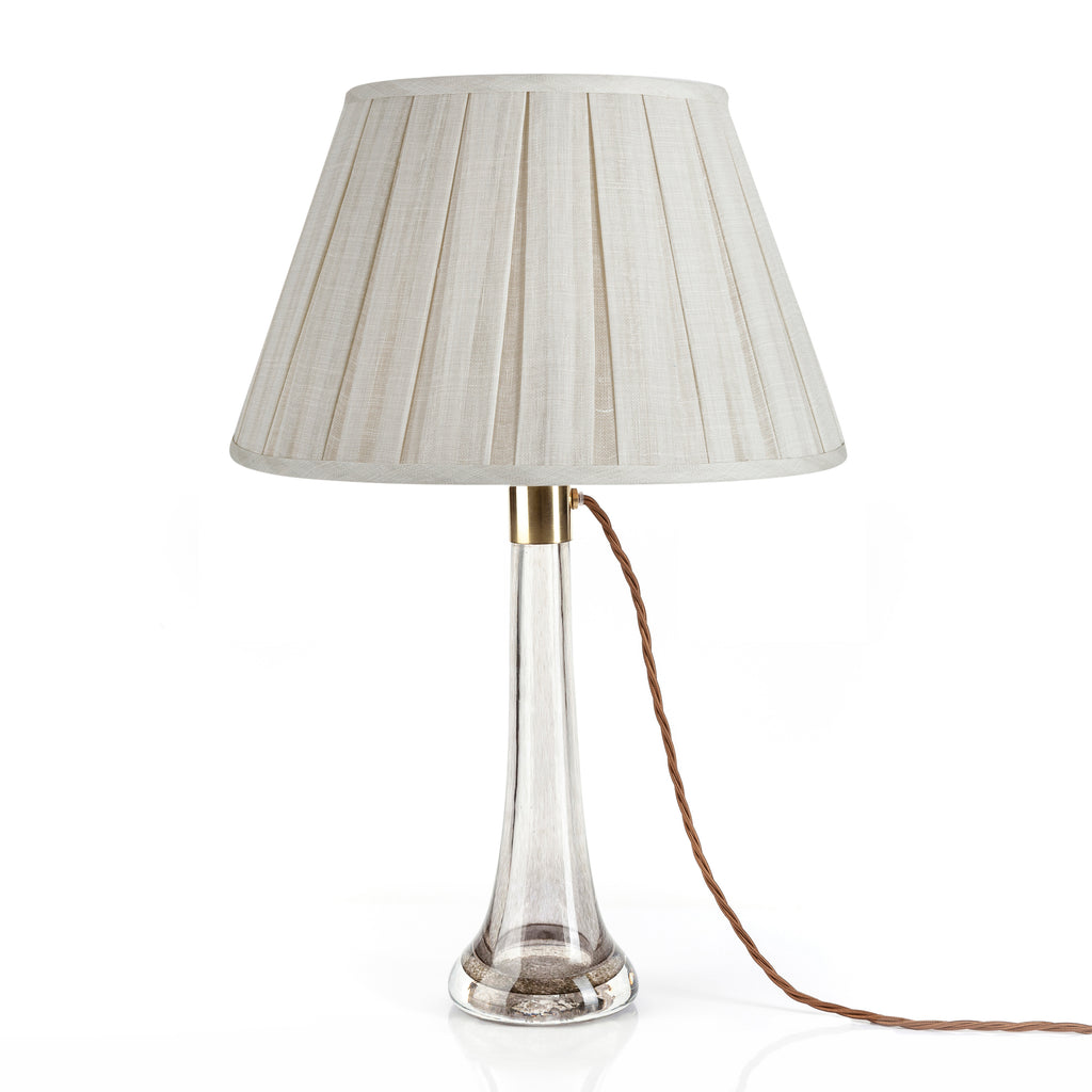Fermoie Cream Moire Box Pleat Lampshade styled on a glass table lamp in Nashville, Tennessee