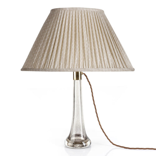 Fermoie Ecru Figured Oval lampshade styled on a glass table lamp in Nashville, Tennessee
