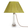 Fermoie Euphorbia oval lampshade styled on a glass table lamp in Nashville, Tennessee