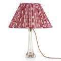 Fermoie Fuchsia Whittle oval lampshade styled on a glass table lamp in Nashville, Tennessee