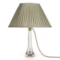 Fermoie Green Figured oval lampshade styled on a glass table lamp in Nashville, Tennessee