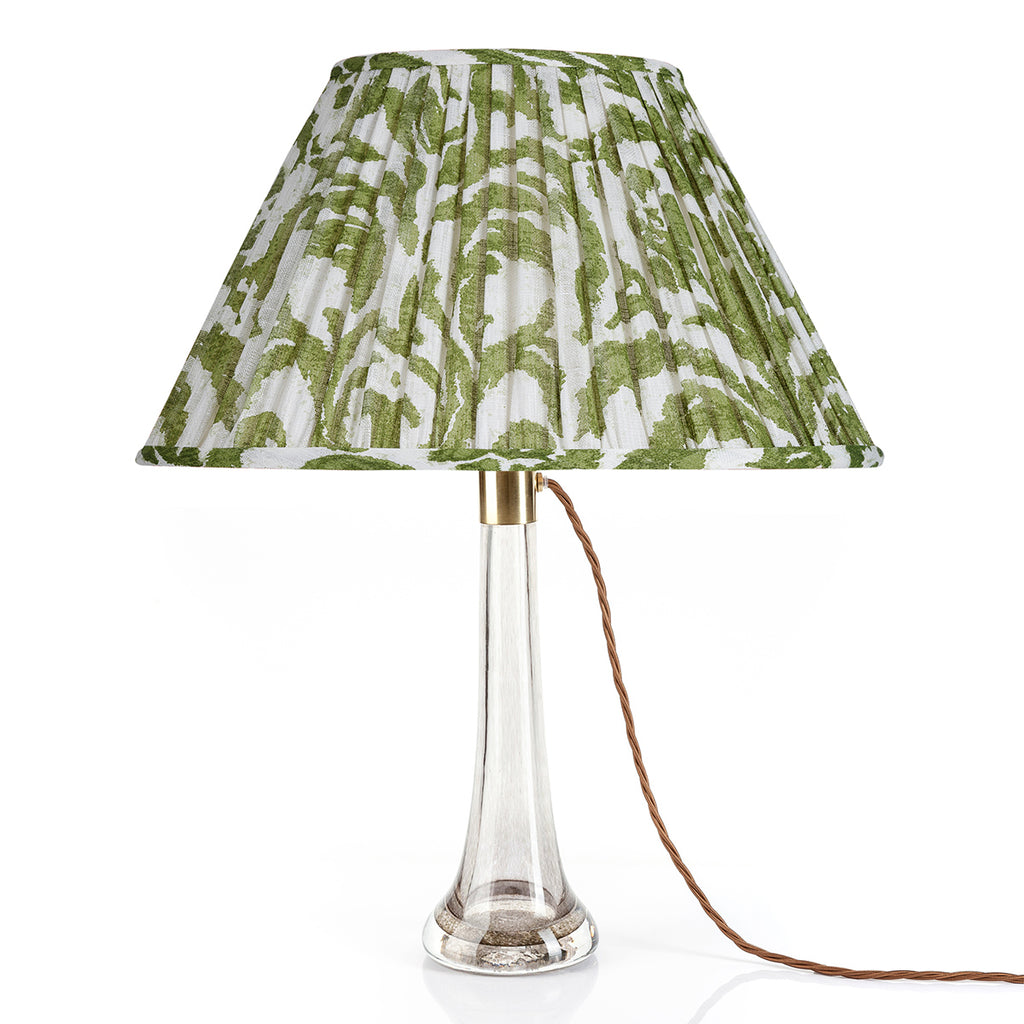 Fermoie Green Marlborough oval lampshade styled on a glass table lamp in Nashville, Tennessee