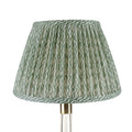 Fermoie Green Popple empire lampshade styled on a glass table lamp in Nashville, Tennessee