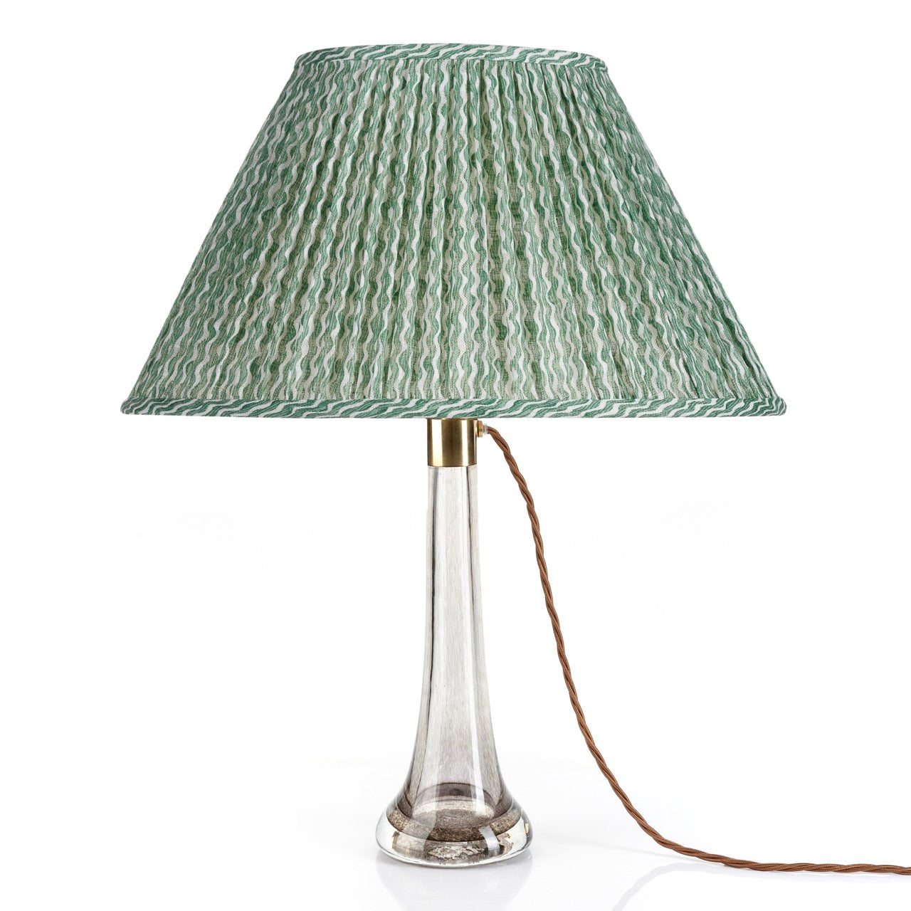 Fermoie Green Popple oval lampshade styled on a glass table lamp in Nashville, Tennessee