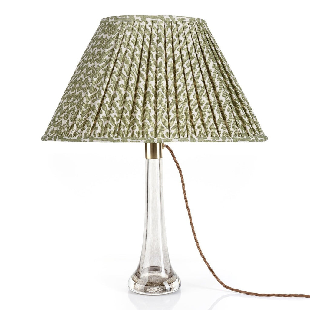 Fermoie Green Rabanna oval lampshade styled on a glass table lamp in Nashville, Tennessee