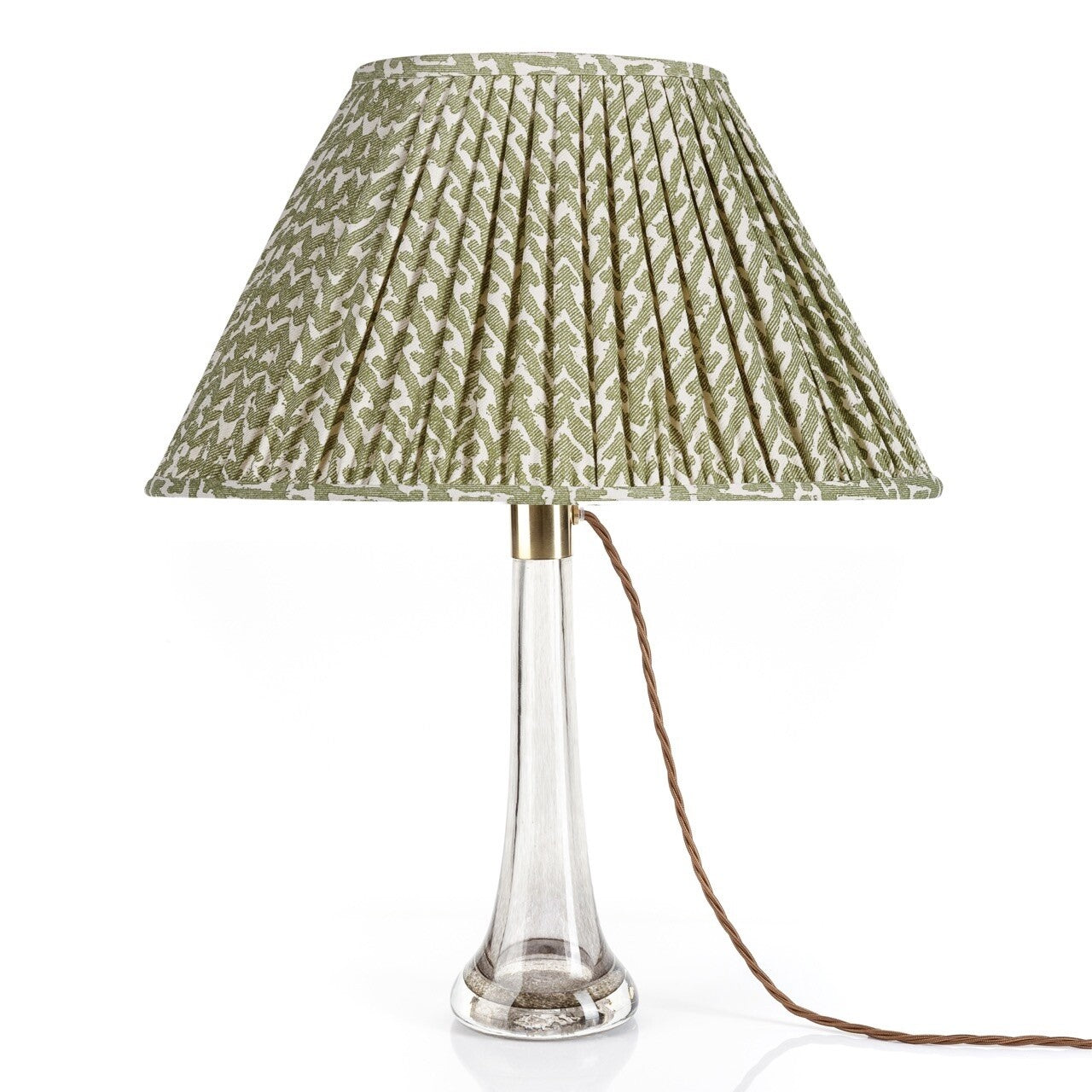 Fermoie Green Rabanna oval lampshade styled on a glass table lamp in Nashville, Tennessee