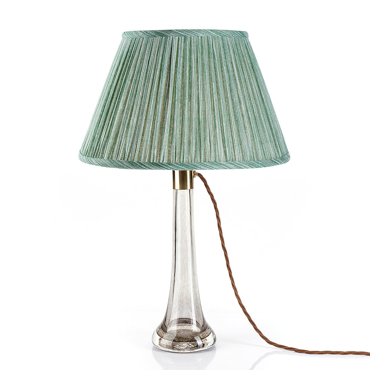Fermoie Green Strié Empire lampshade styled on a glass table lamp in Nashville, Tennessee