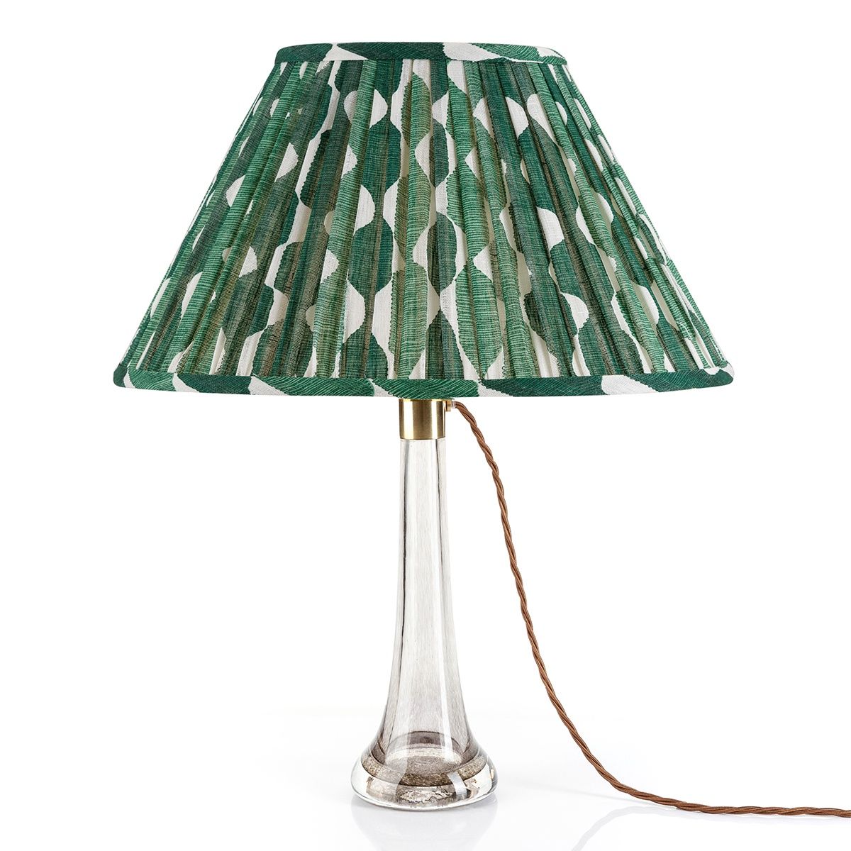 Fermoie Green Whittle oval lampshade styled on a glass table lamp in Nashville, Tennessee