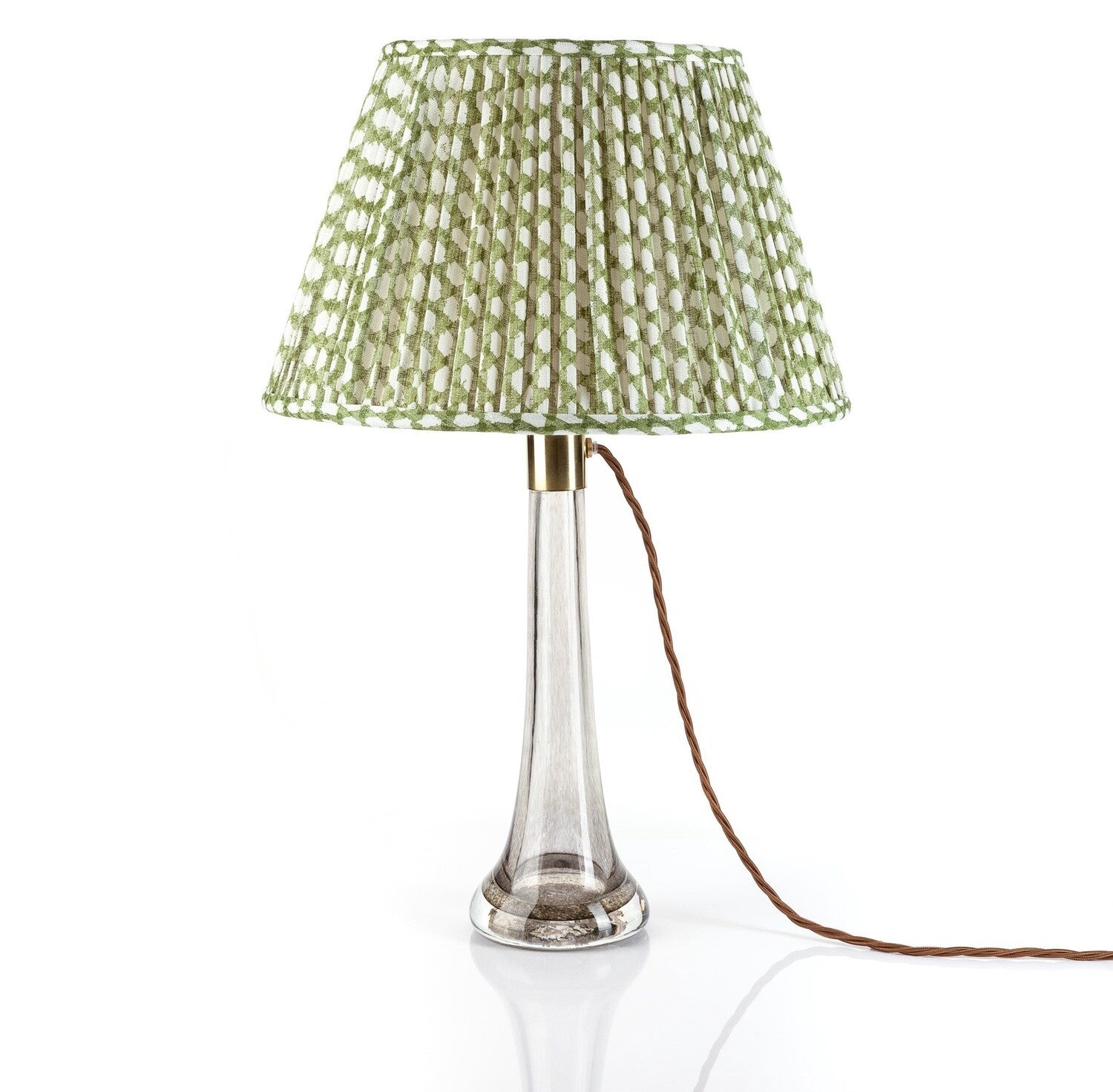 Fermoie Green Wicker empire lampshade styled on a glass table lamp in Nashville, Tennessee