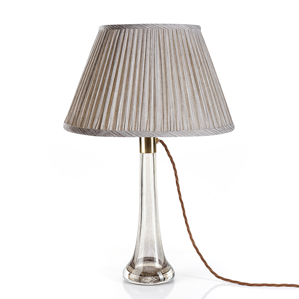 Fermoie Grey Strié Empire lampshade styled on a glass table lamp in Nashville, Tennessee