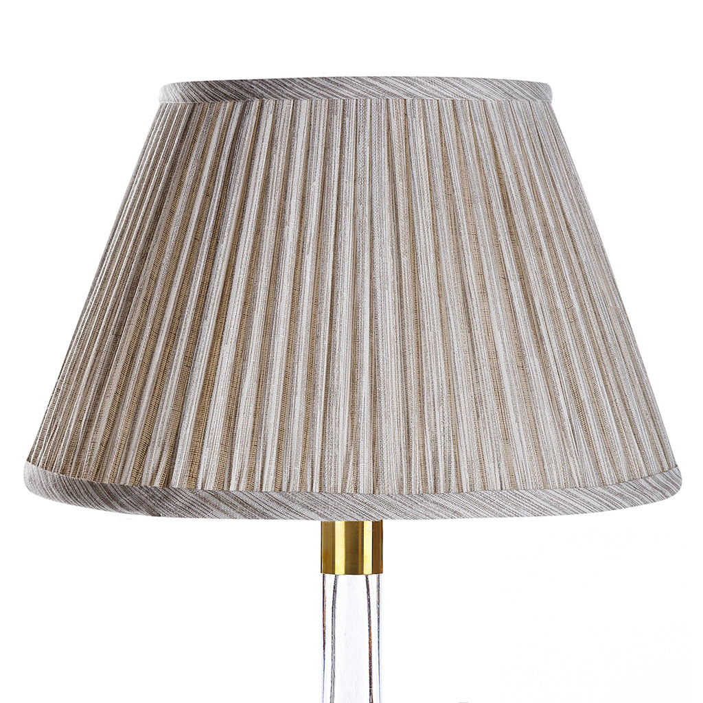 Fermoie Grey Strié empire lampshade styled on a glass table lamp in Nashville, Tennessee