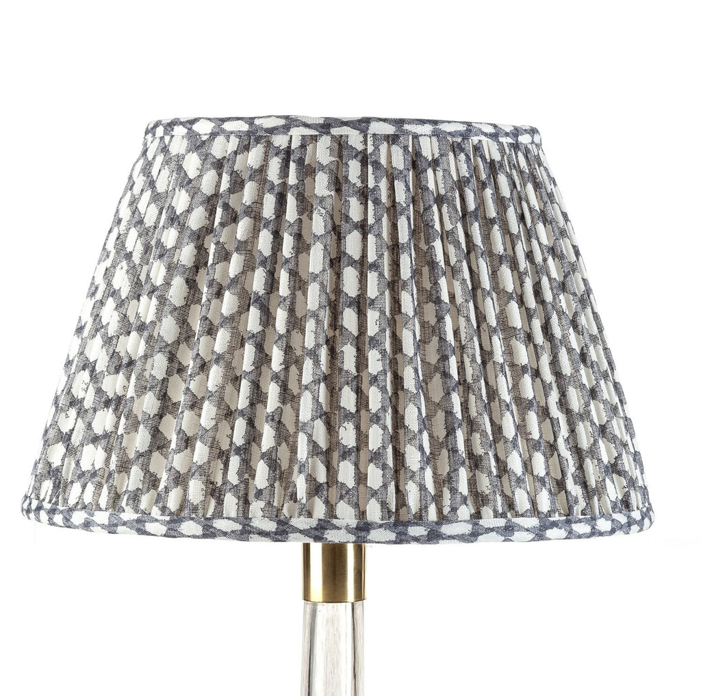 Fermoie Grey Wicker empire lampshade styled on a glass table lamp in Nashville, Tennessee