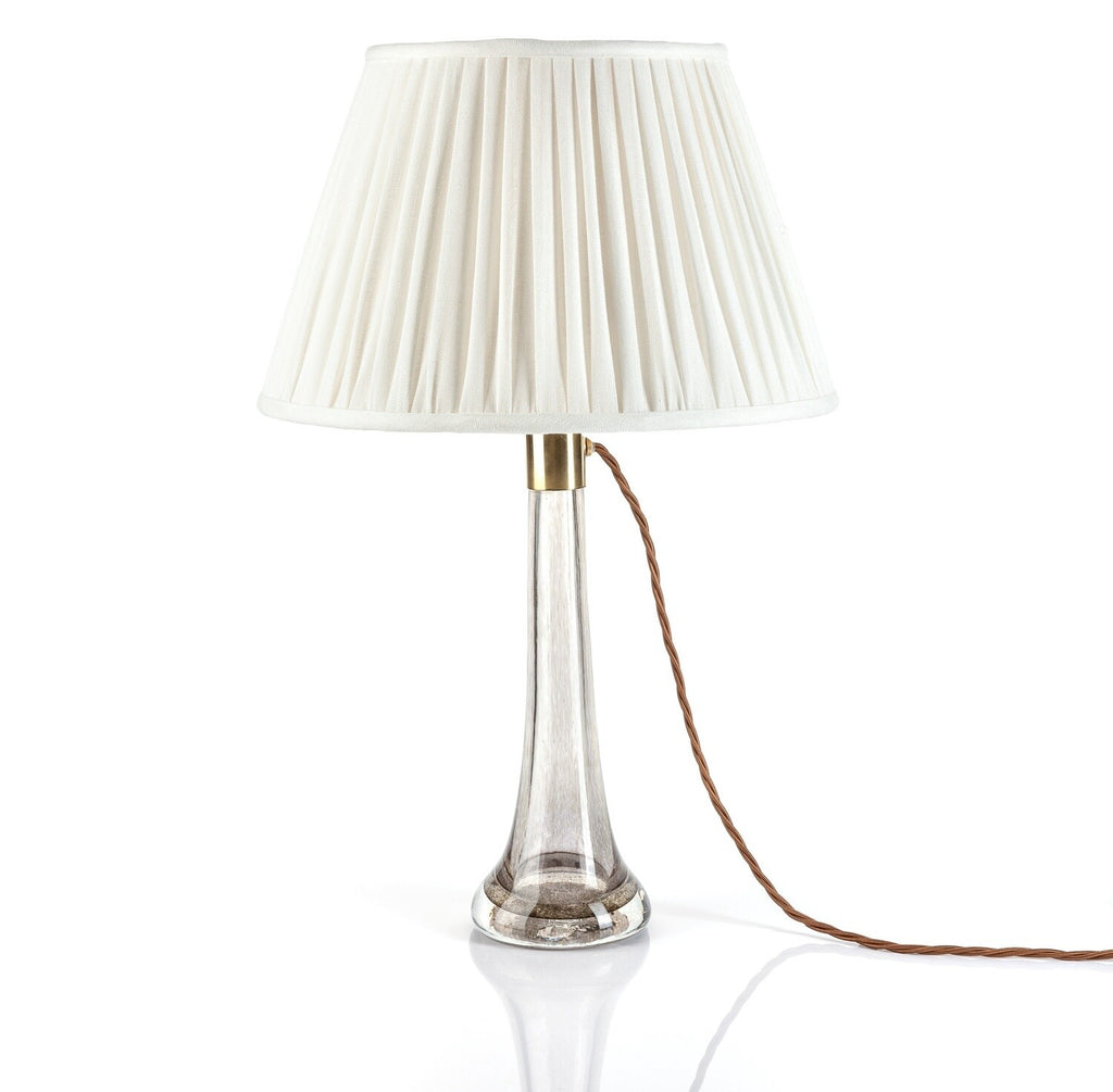 Fermoie Ivory Linen empire lampshade styled on a glass table lamp in Nashville, Tennessee
