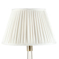 Fermoie Ivory Linen empire lampshade styled on a glass table lamp in Nashville, Tennessee