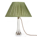Fermoie Kintyre Green oval lampshade styled on a glass table lamp in Nashville, Tennessee