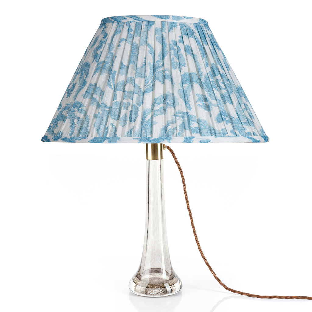Fermoie Light Blue Marlborough oval lampshade styled on a glass table lamp in Nashville, Tennessee