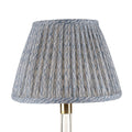 Fermoie Light Blue Popple empire lampshade styled on a glass table lamp in Nashville, Tennessee