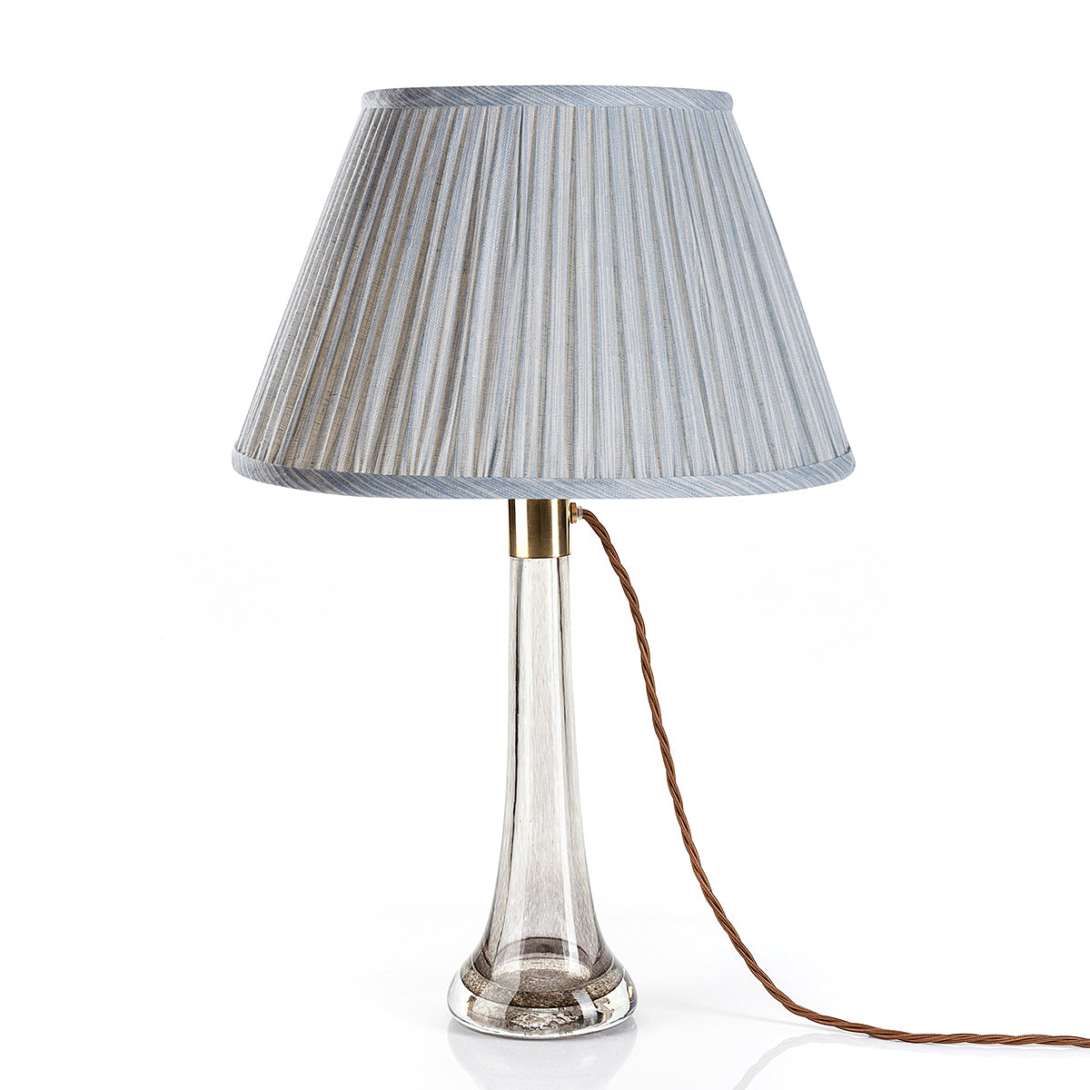 Fermoie Light Blue Strié Empire lampshade styled on a glass table lamp in Nashville, Tennessee