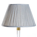 Fermoie Light Blue Strié empire lampshade styled on a glass table lamp in Nashville, Tennessee