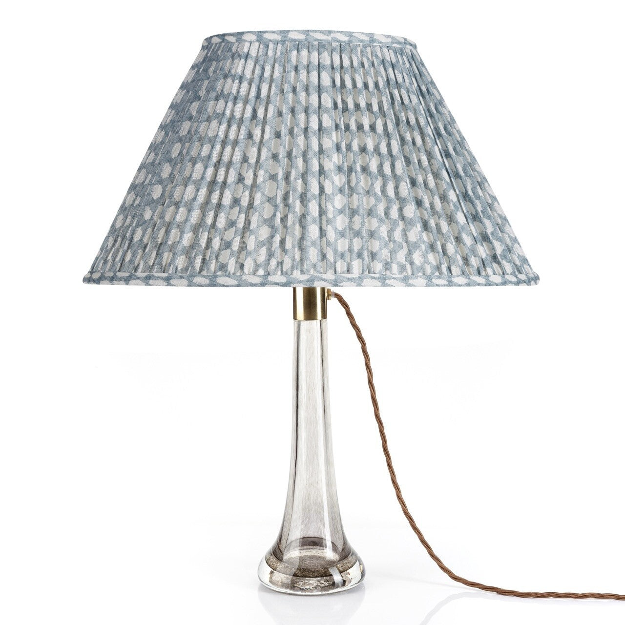 Fermoie Light Blue Wicker Oval lampshade styled on a glass table lamp in Nashville, Tennessee