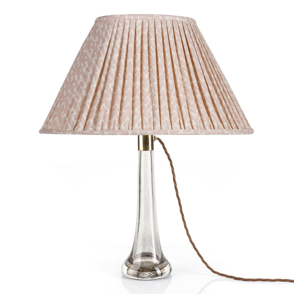 Fermoie Light Pink Rabanna oval lampshade styled on a glass table lamp in Nashville, Tennessee