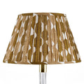 Fermoie Neutral Whittle empire lampshade styled on a glass table lamp in Nashville, Tennessee