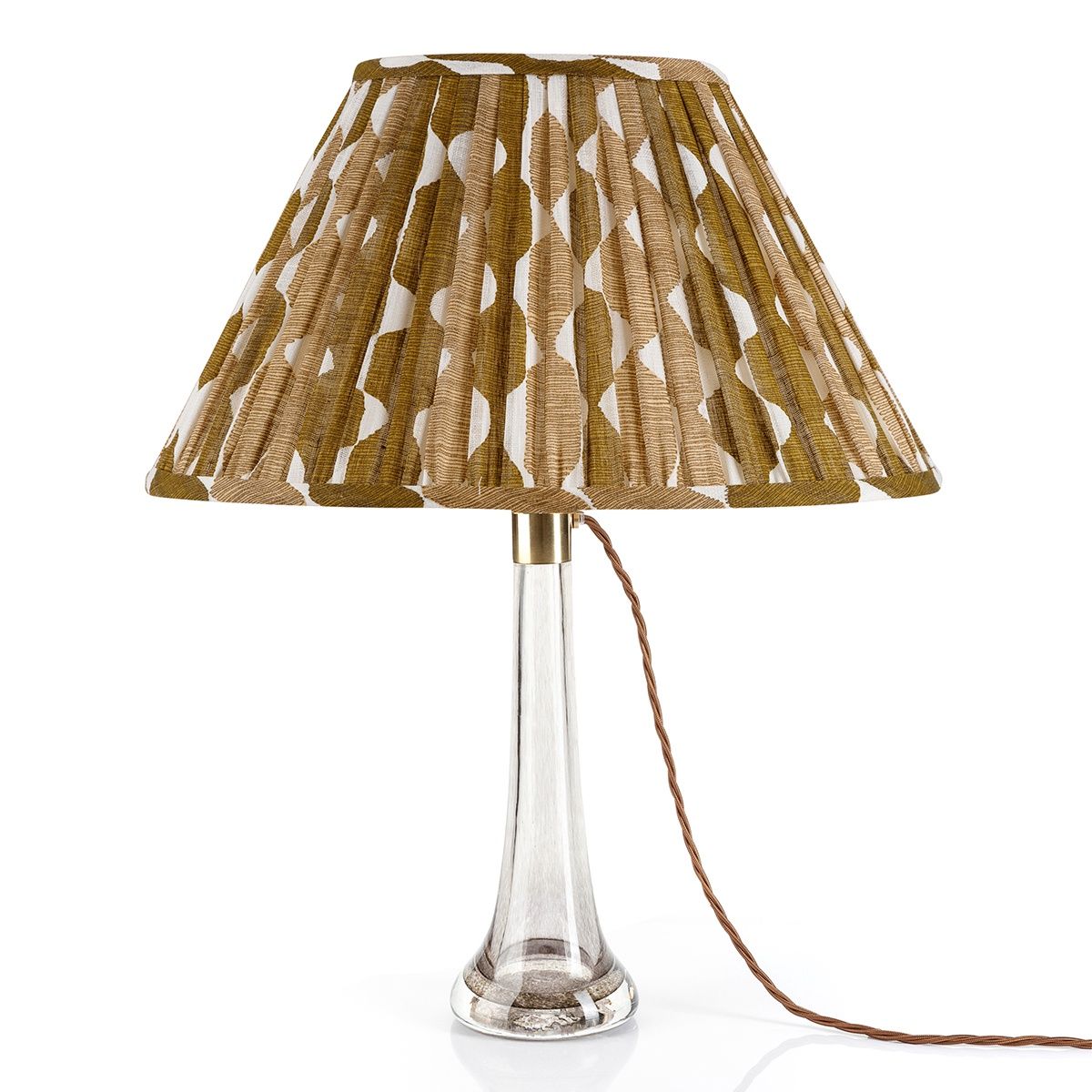 Fermoie Neutral Whittle oval lampshade styled on a lucite table lamp in Nashville, Tennessee